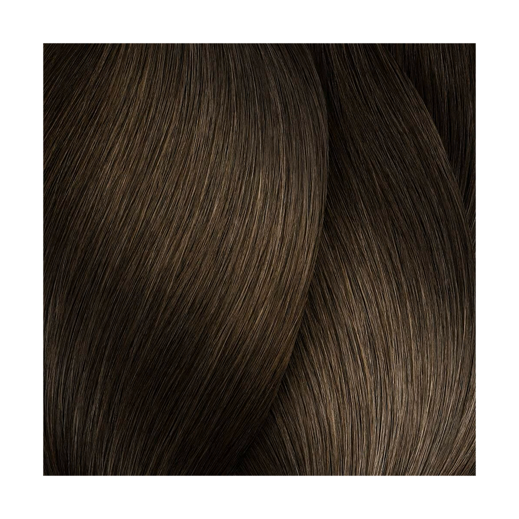 Close-up of dark brown hair strands on a white background