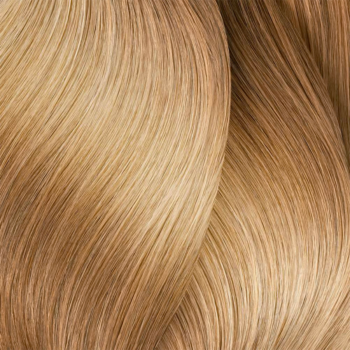 Close-up of blonde hair strands with a wavy texture