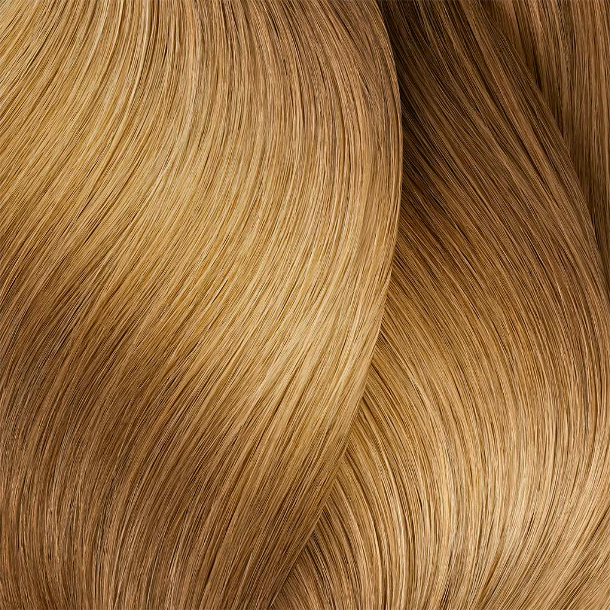 Close-up of blonde hair strands with a wavy texture