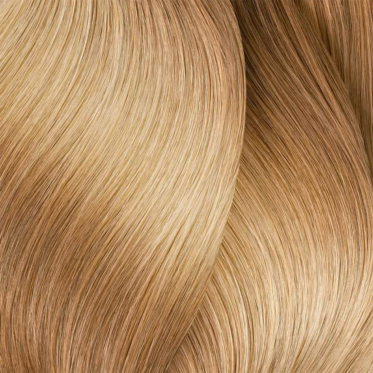 Close-up of blonde hair strands with a wavy texture